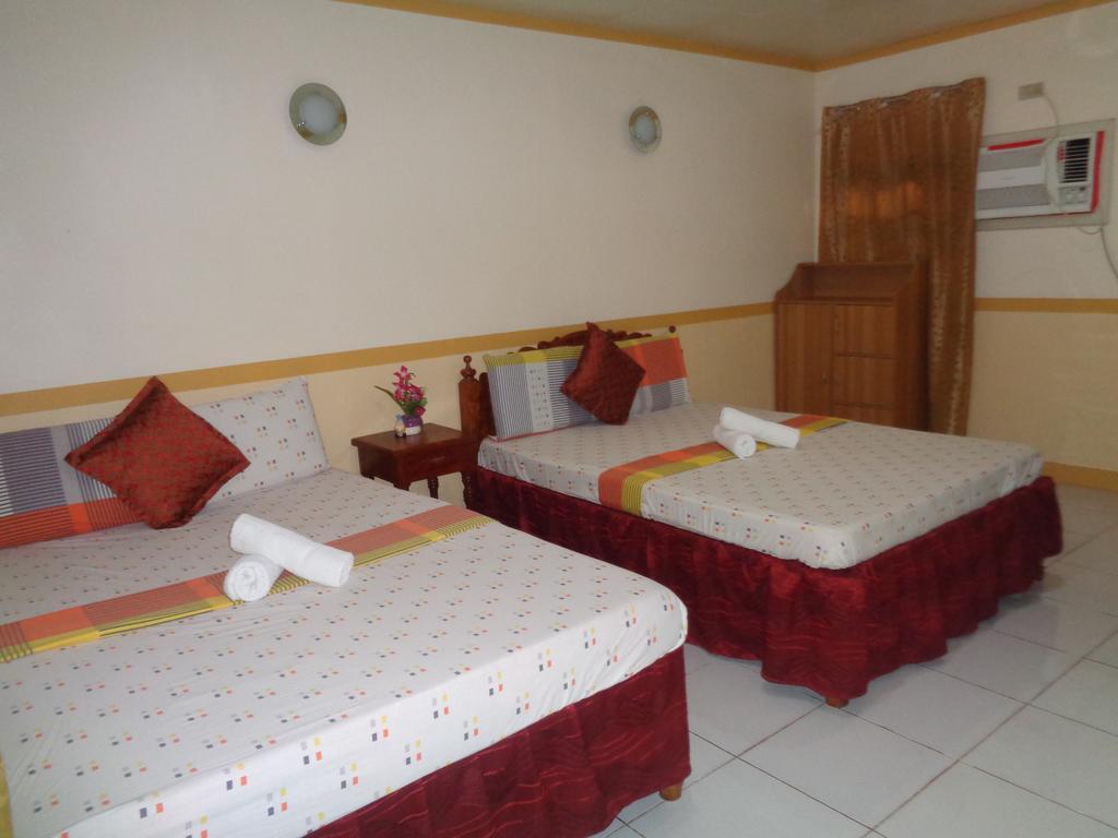 D'Lucky Garden Inn & Suites Tiniguiban Екстер'єр фото