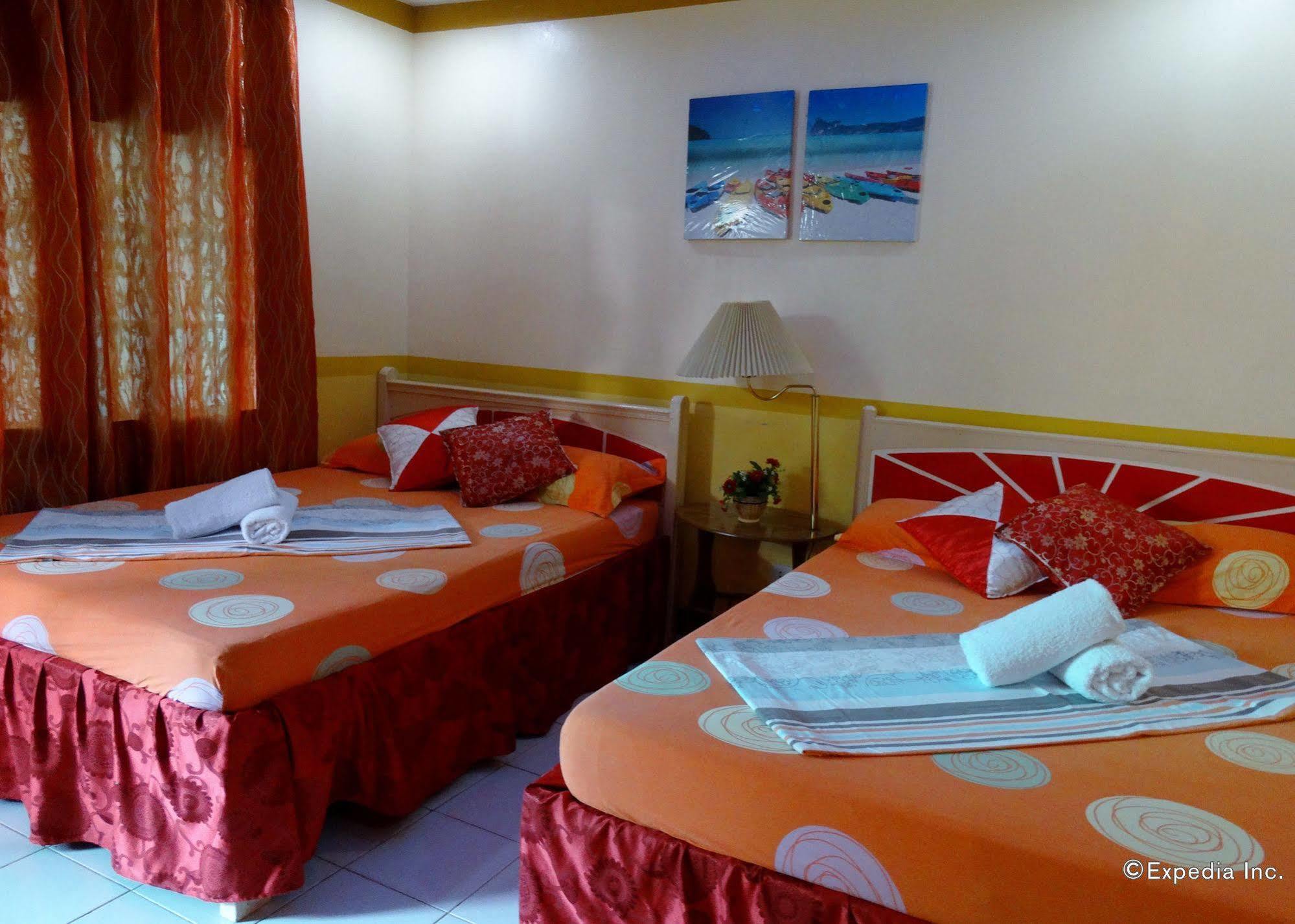 D'Lucky Garden Inn & Suites Tiniguiban Екстер'єр фото