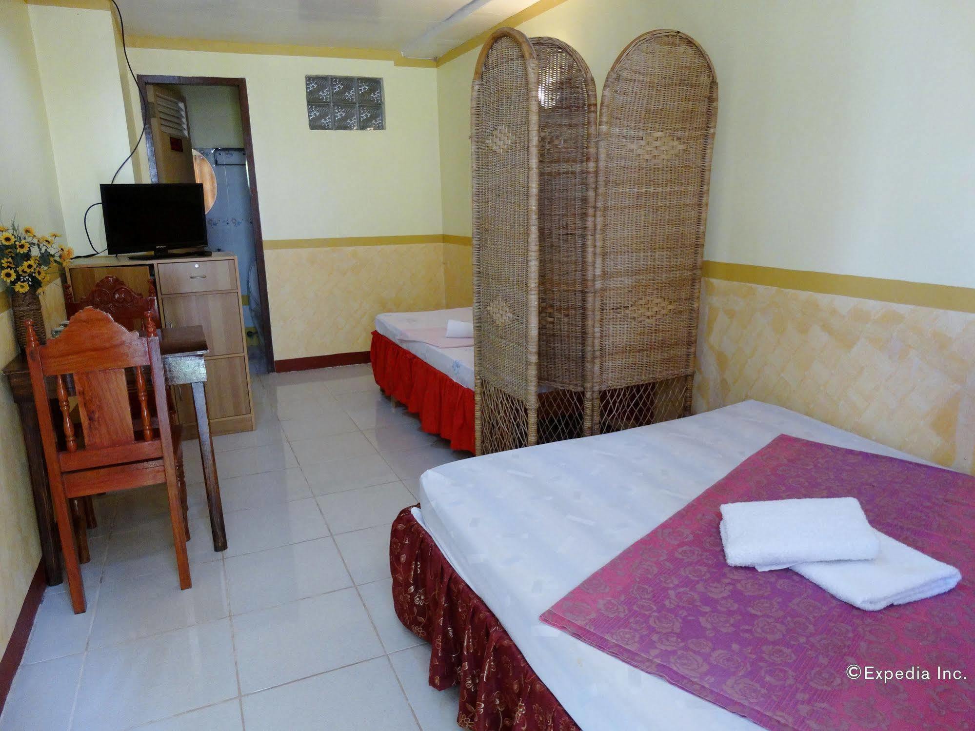 D'Lucky Garden Inn & Suites Tiniguiban Екстер'єр фото